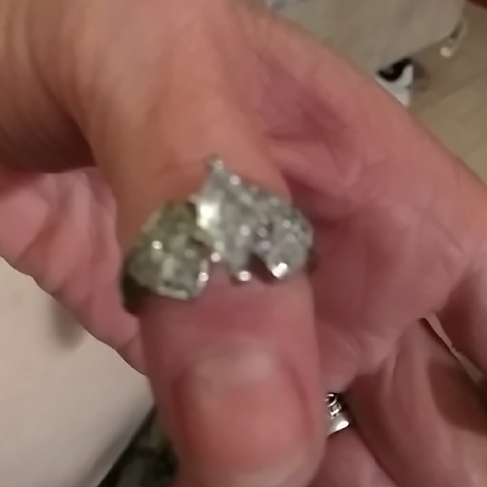Lady's ring 24 small coz and pr incess cut  1/2 ct